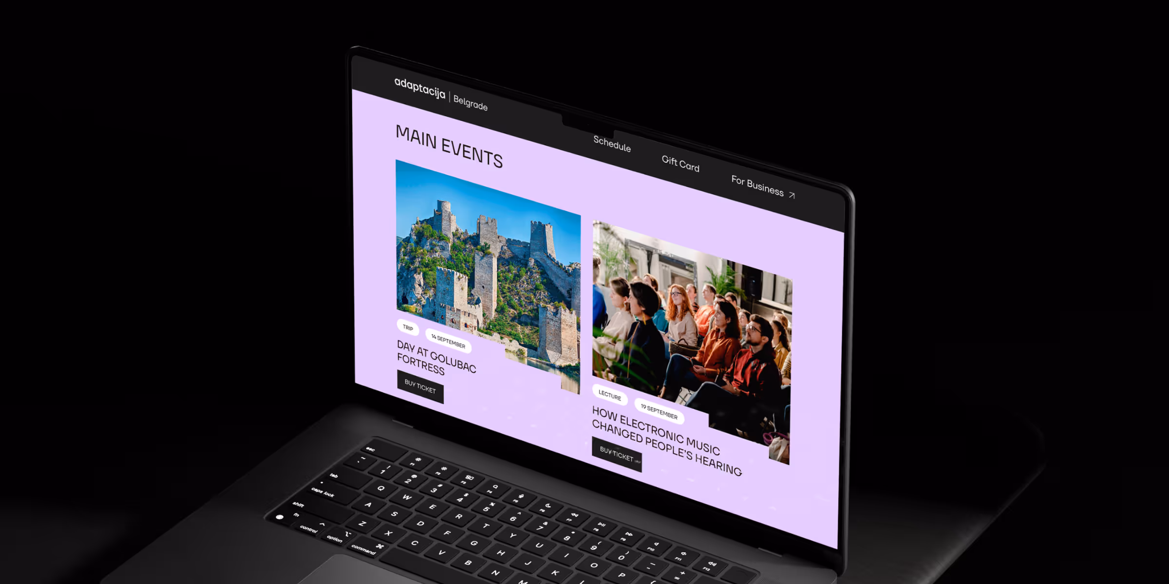 Adaptacija website open on a laptop