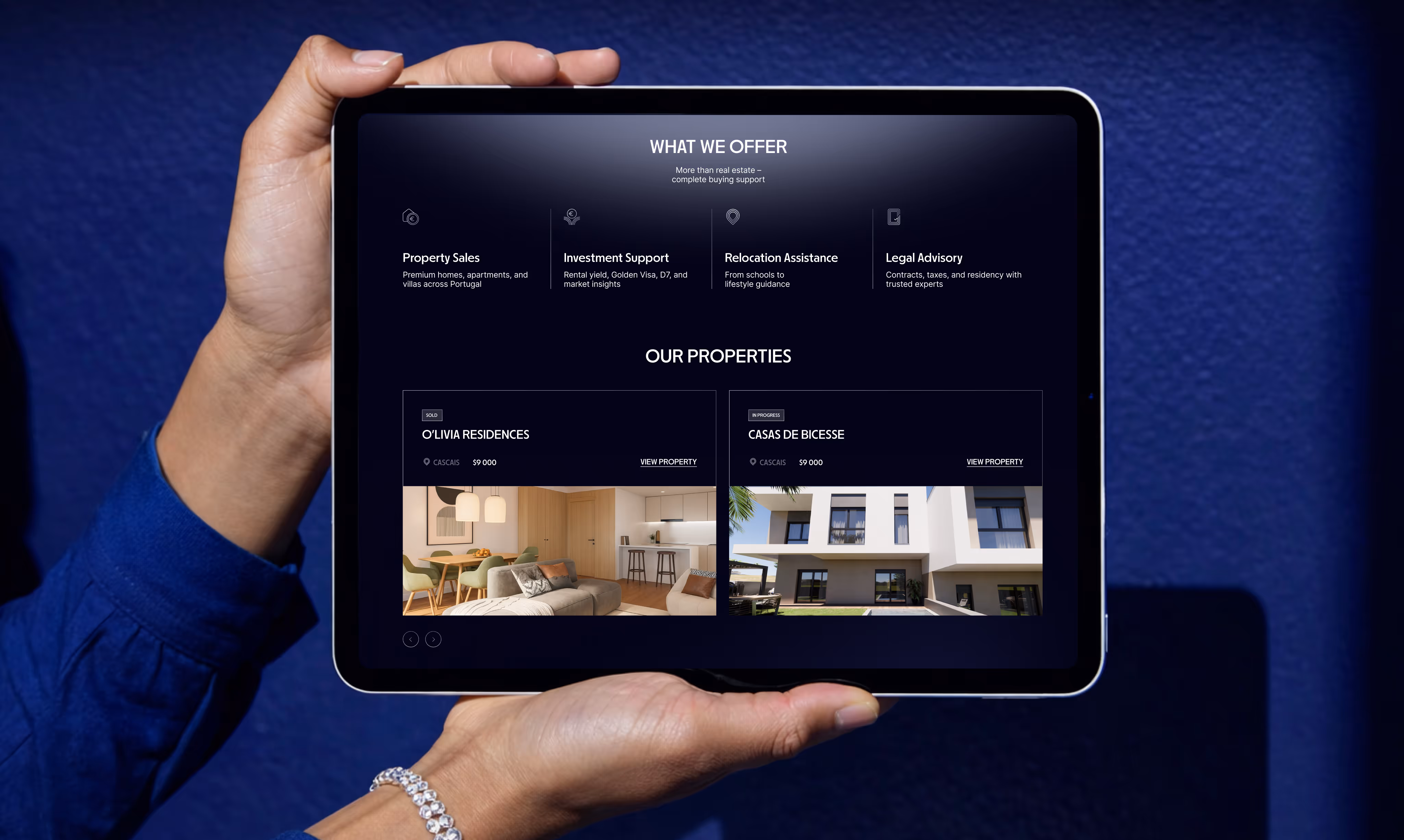 Bravestone website on a tablet held in both hands
