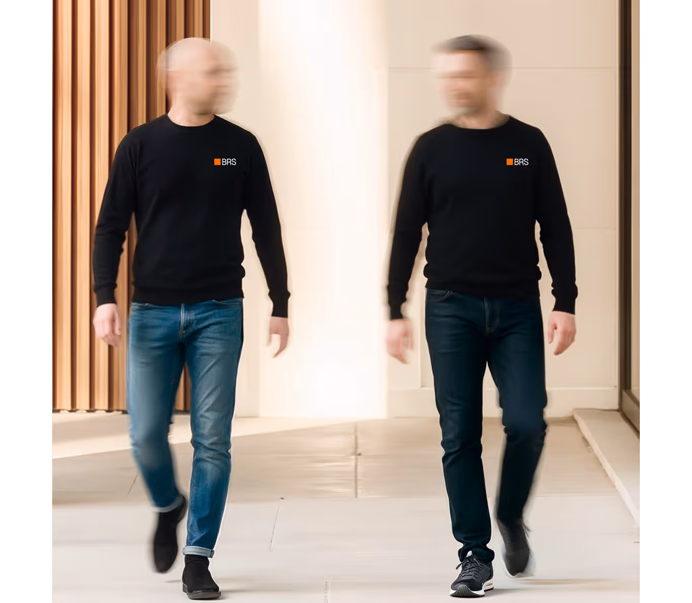 Two people wearing BRS-branded sweatshirts