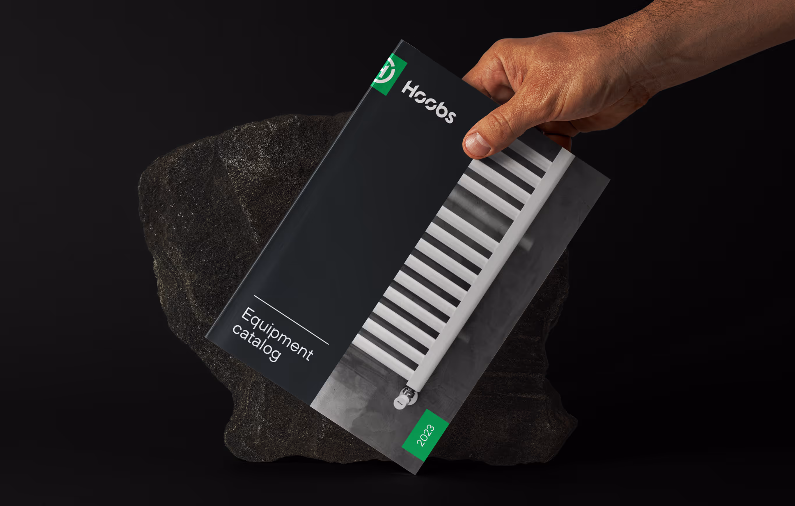 Hoobs equipment catalogue held in a hand