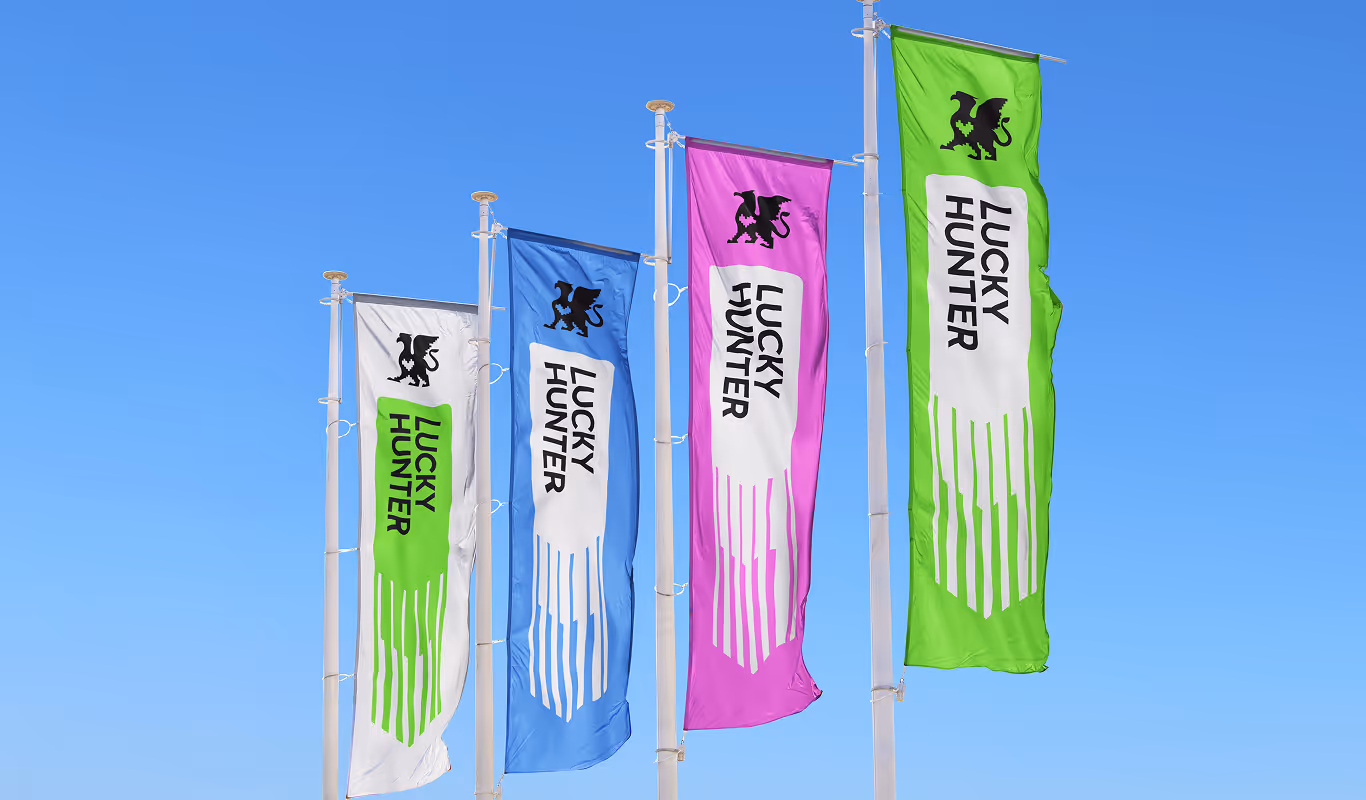 Lucky Hunter flags in green, blue and pink