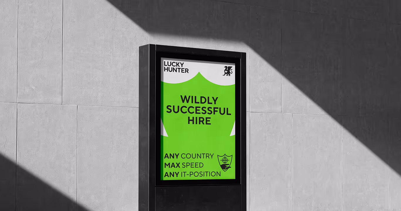 Lucky Hunter poster on a wall — 'Wildly successful hire'