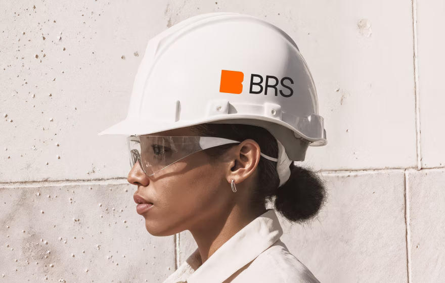 Construction worker wearing a BRS-branded hard hat