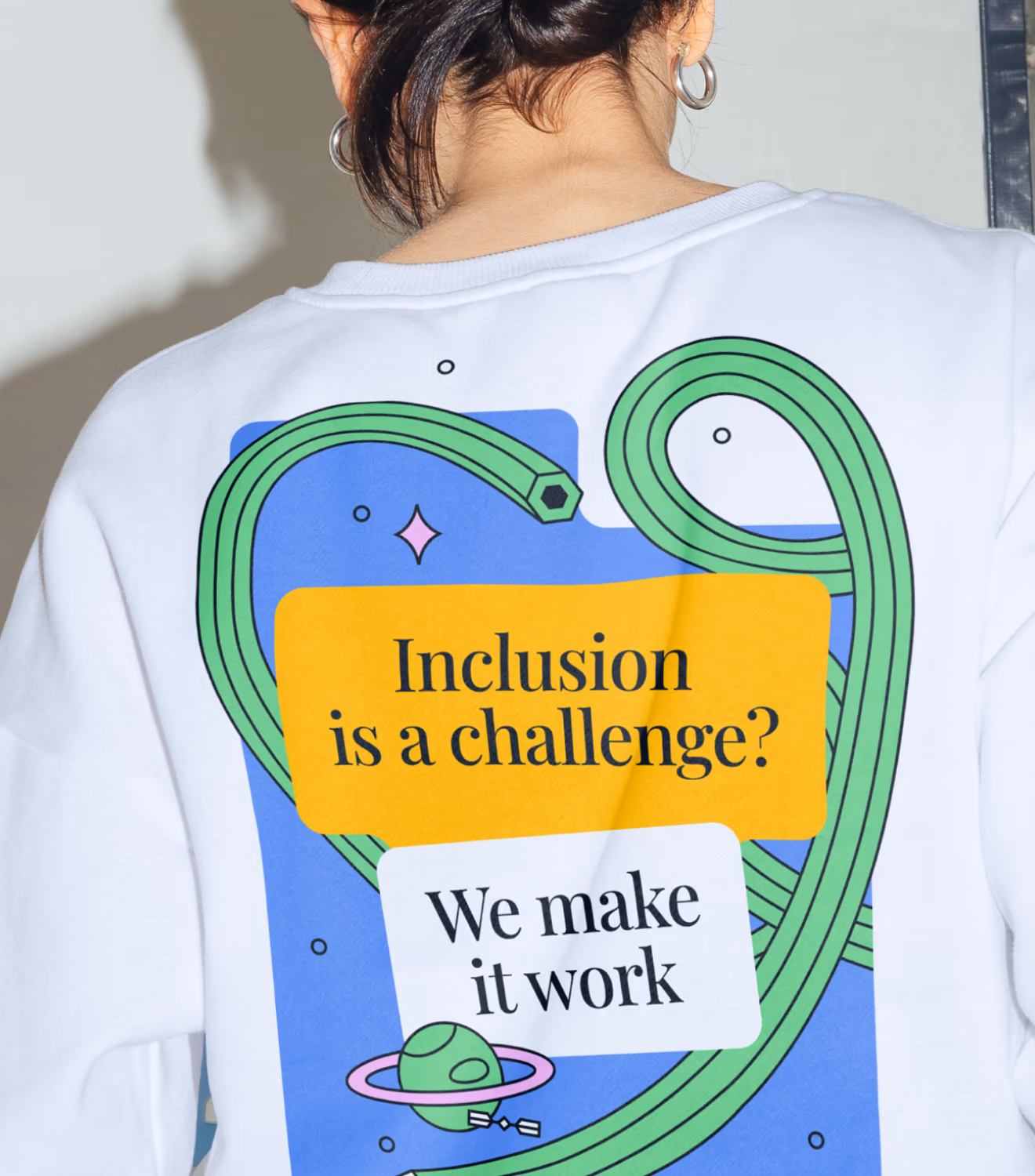 UNOWA sweatshirt with the 'Inclusion is a challenge?' illustration